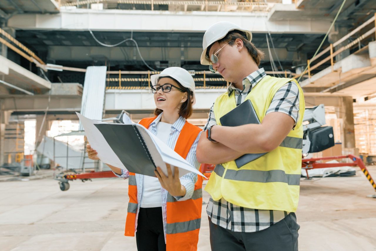 female construction inspector examining construction site .jpg